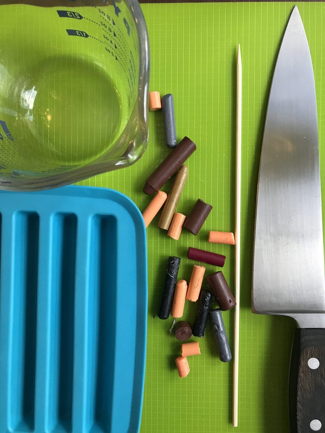 Colorful broken crayons and tools for recycling activity at Miriam P. Brenner Children's Museum.