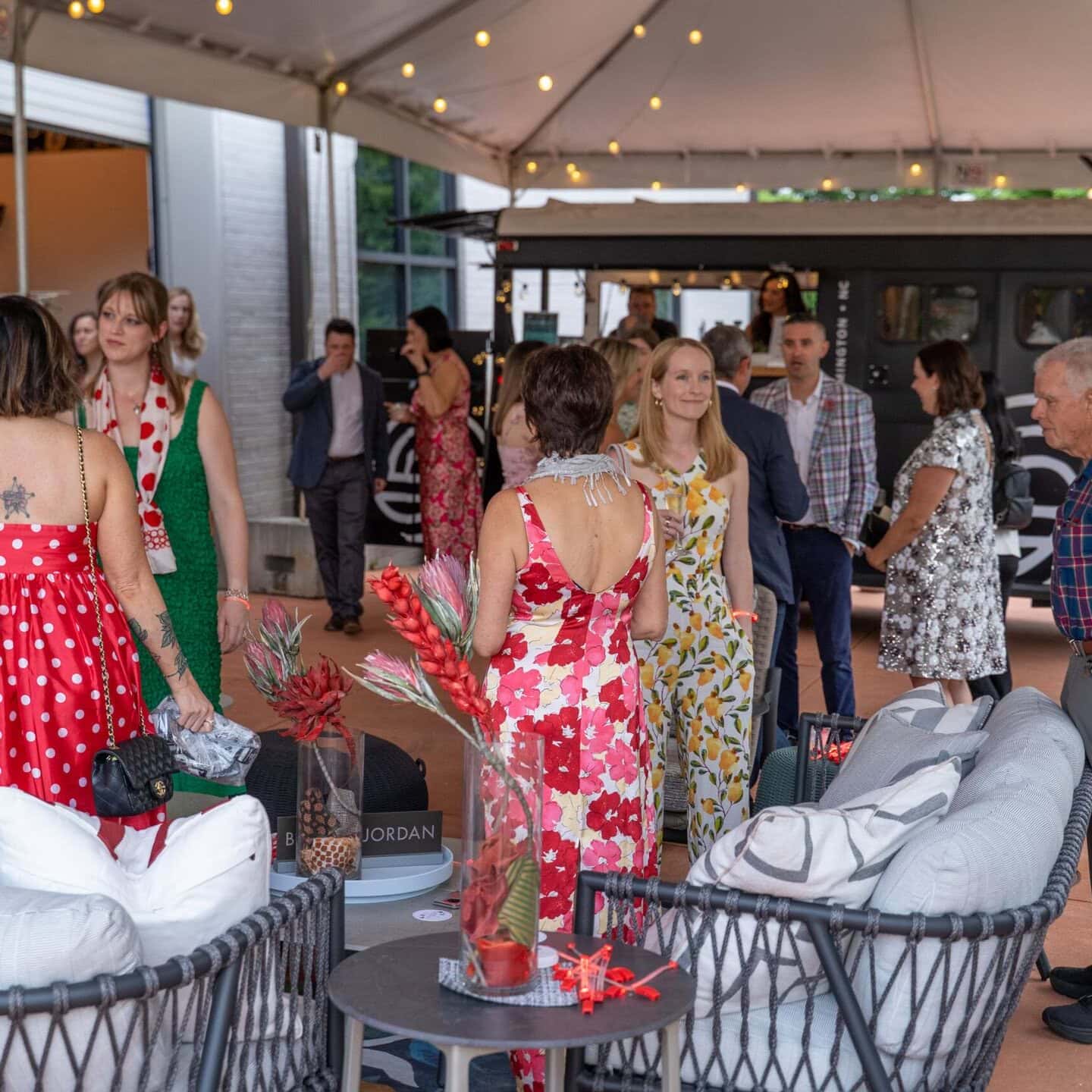 Gala event at miriam p. Brenner children's museum with guests socializing under a tent.