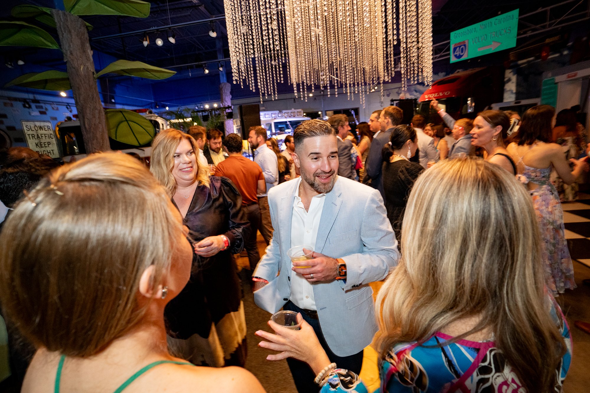 People enjoying a social event at Miriam P. Brenner Children's Museum.
